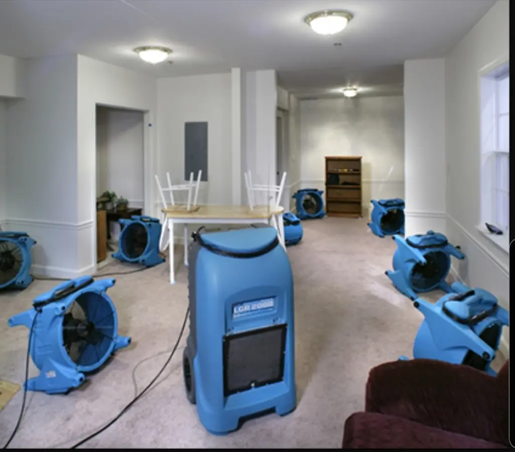 Air movers and dehumidifier setup for Water Damage Restoration in Central Point